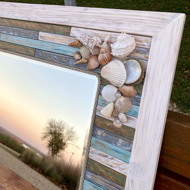 to a white sandy beach. The mirror took a particularly long time to make.
